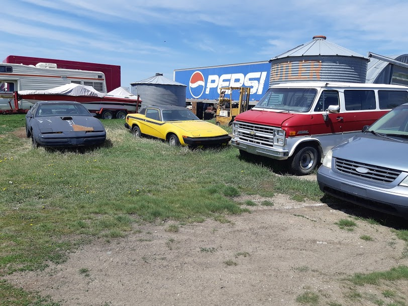 Illustration for article titled Farmyard cars I found this week. (none of which are late model Corvairs)